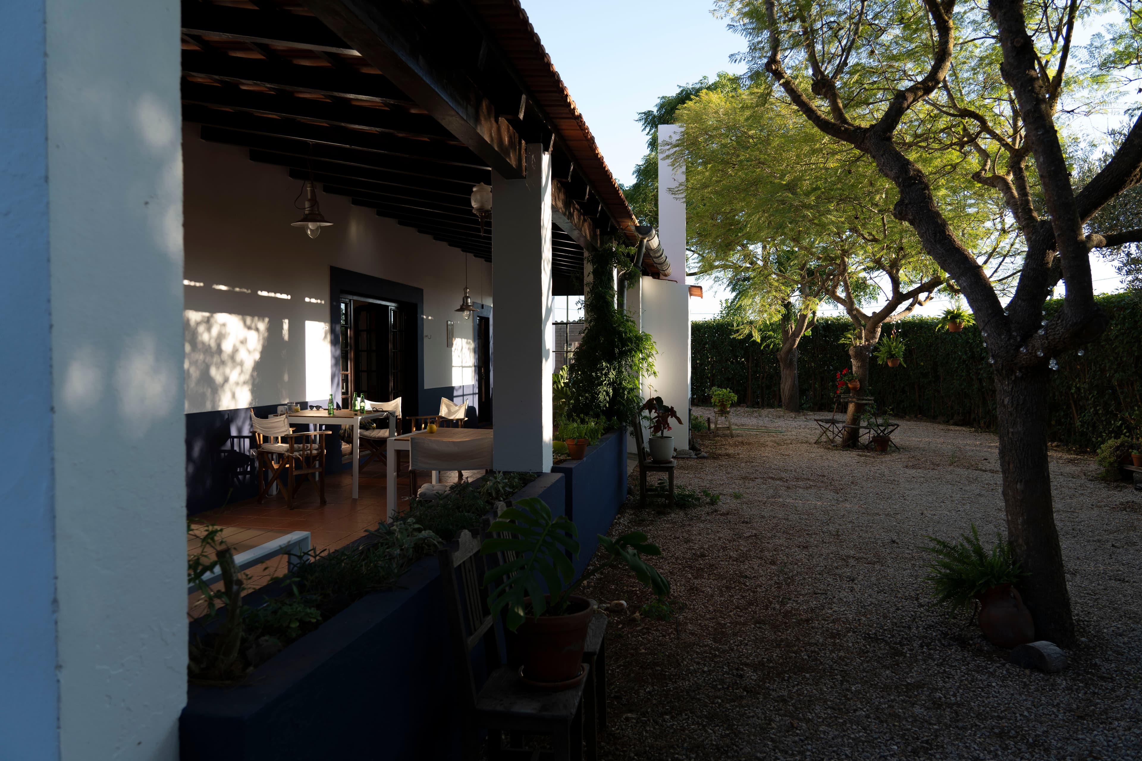Whitewashed porch at golden hour