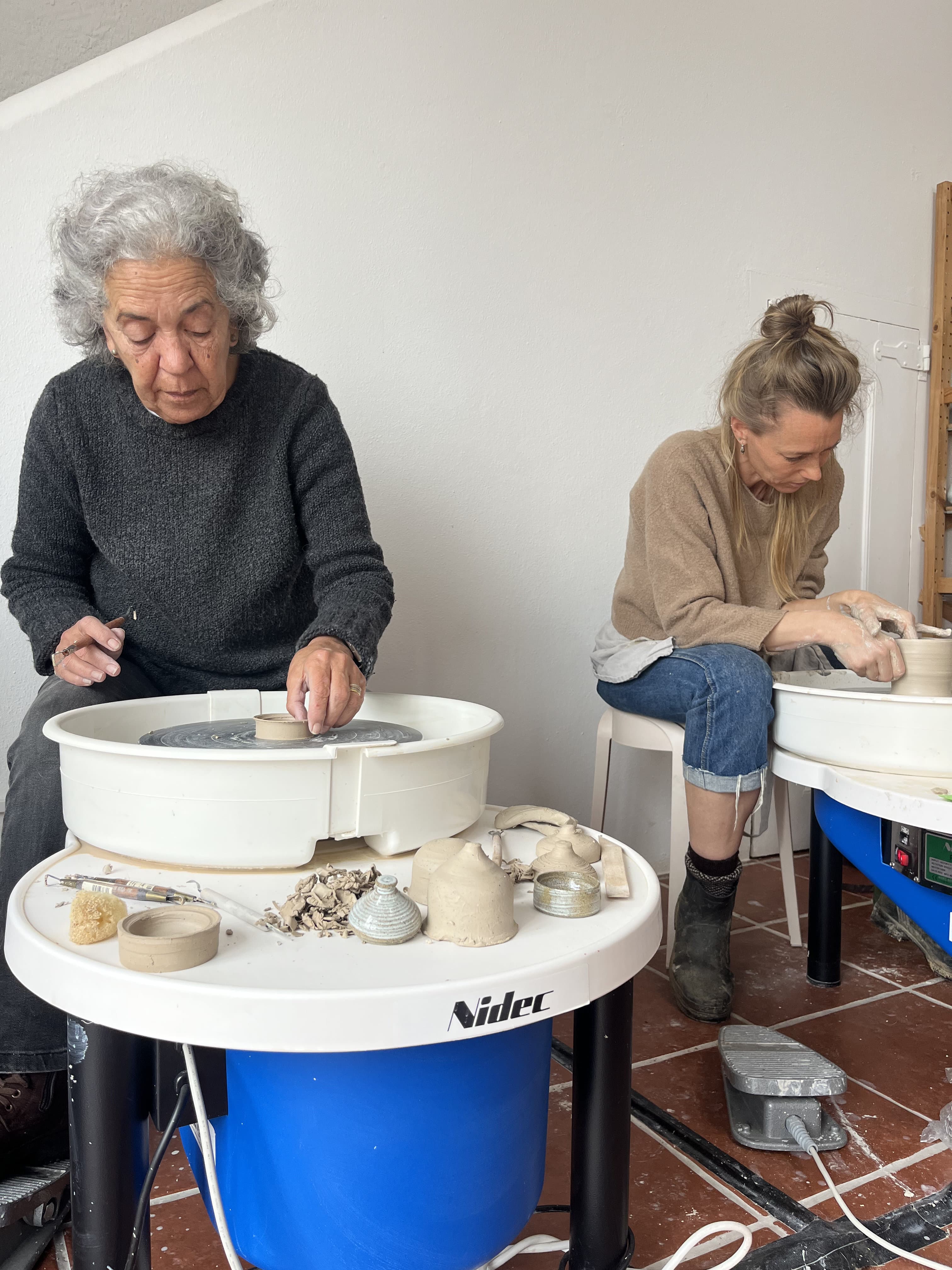 At work at the pottery wheels